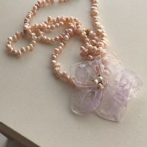 Delicate statement necklace, pale colors